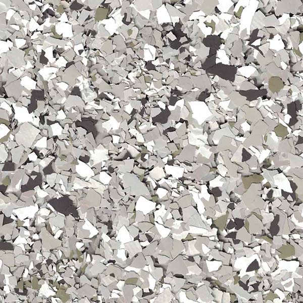 This image shows an assortment of irregularly shaped particles in various shades of gray, white, and black, resembling a collection of stones or minerals.